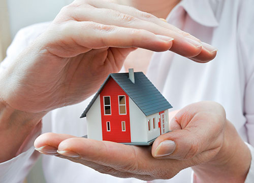 Propane Safety Image of Hands Holding a House